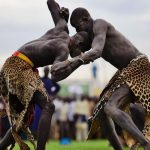 Wrestlers from Jonglei and Eastern Lakes State take on each other at Juba Wtadium on April 20, 2016