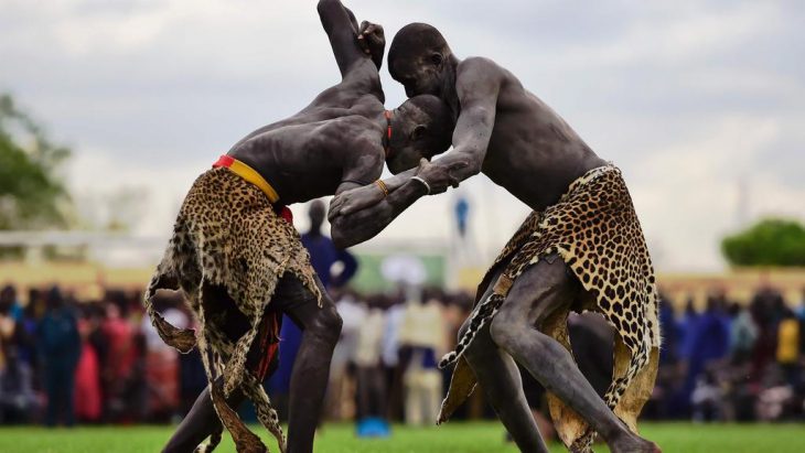 Wrestlers from Jonglei and Eastern Lakes State take on each other at Juba Wtadium on April 20, 2016